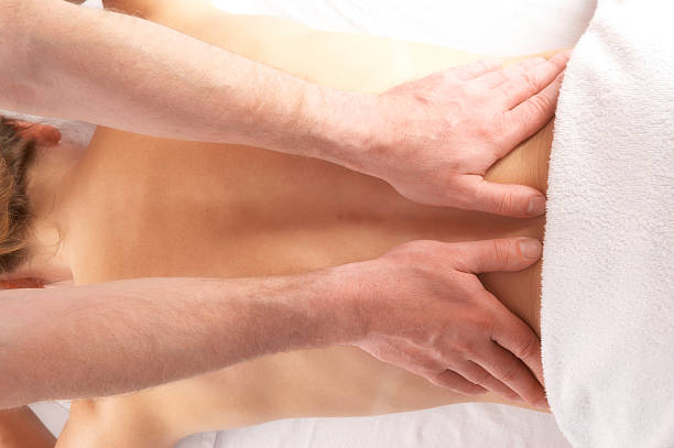 istock gentle massage of the lower back 94464671