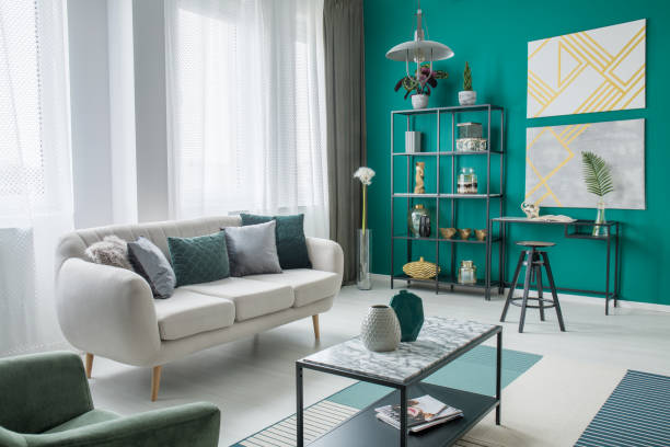 istock Gold and green living room 944647590
