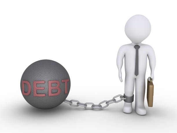 istock Businessman with a debt chain ball 944648246