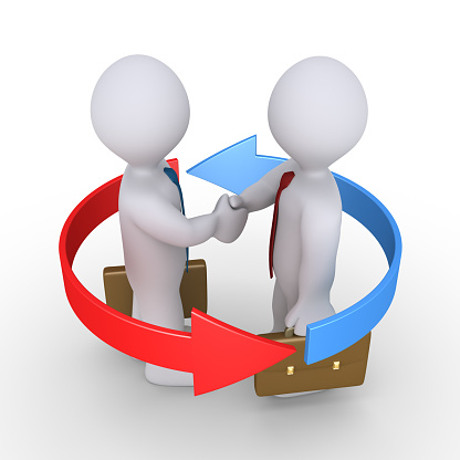 Two businessmen shake hands inside a circle of two arrows