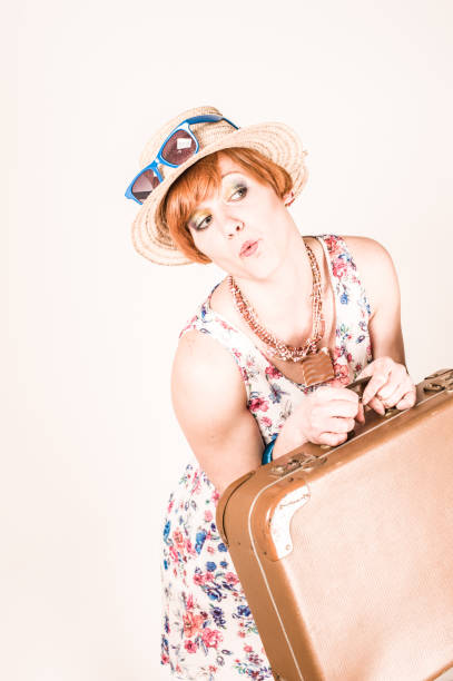 istock Cute Young Woman Going to Summer Vacations with Suitcase 944663850