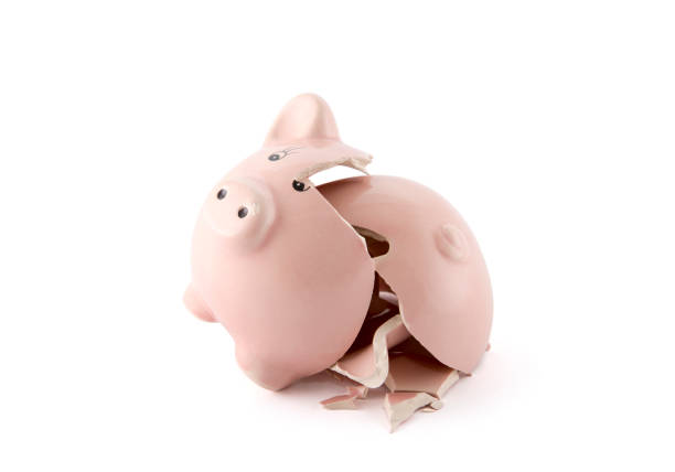 istock Broken piggy bank on white background with clipping path 944667514