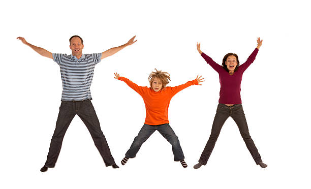 istock funny family in astride jump 94467269