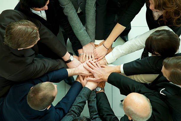 istock hands of business people 94467414
