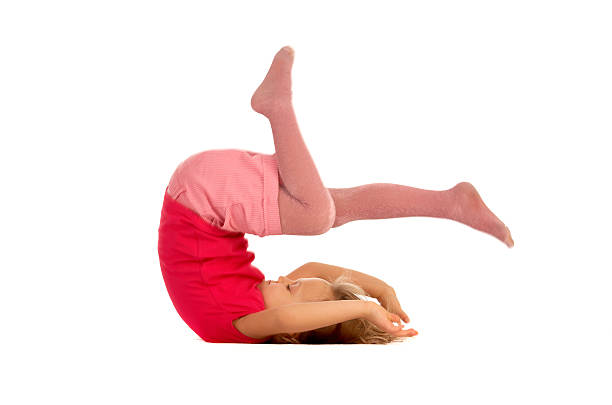 beautiful flexible woman doing yoguna white background