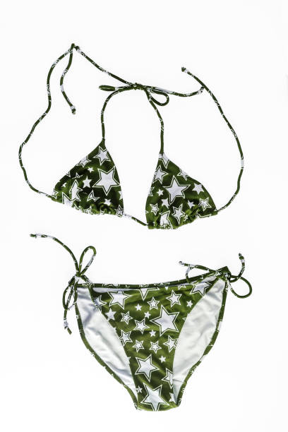 istock multi-colored beach bikini with fashionable pattern in stars isolated on white background 944676114