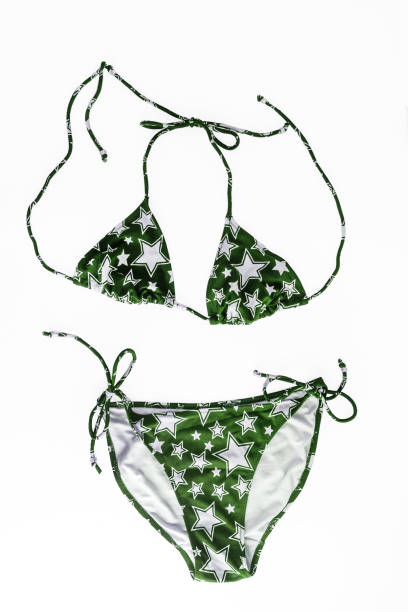 istock multi-colored beach bikini with fashionable pattern in stars isolated on white background 944677906