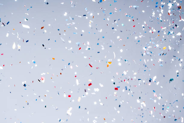 istock Confetti party on background. Celebration concept. 944689654