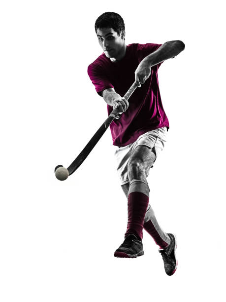 istock field hockey player man isolated silhouette white background 944699962