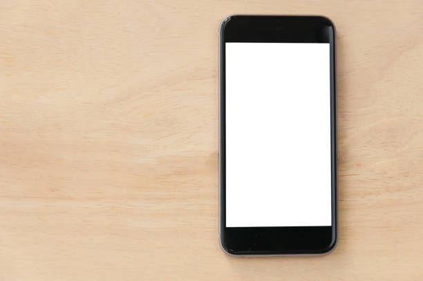 istock Blank screen smartphone on wooden background 944701800