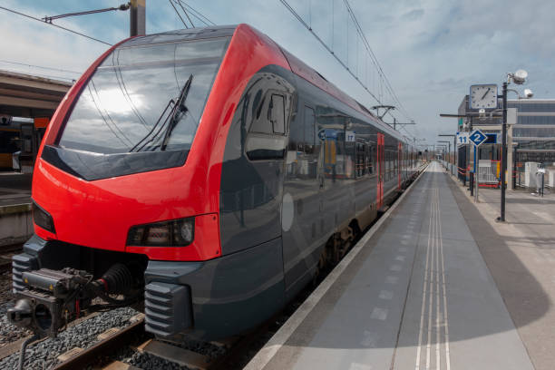 istock New red on grey colored district train on platform in Gouda 944707330