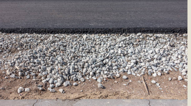 istock Gravel foundation layer for new tarmac road 944707402