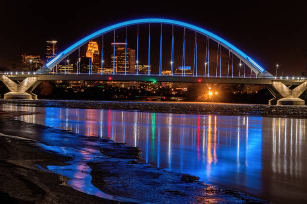 istock Lowry Bridge colored blue with Minneapolis Skyline behind 944707964