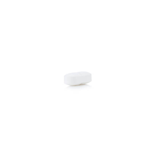 istock pill.  tablet. color white. single. isolated on white background 944710942