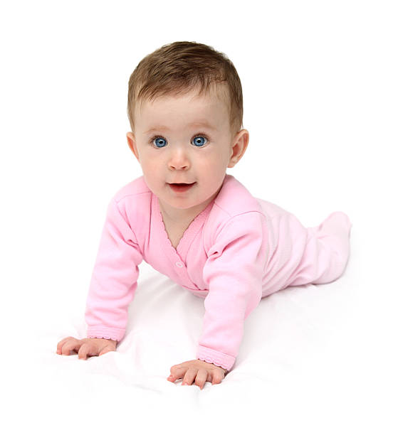istock baby in pink on white sheet 94471732