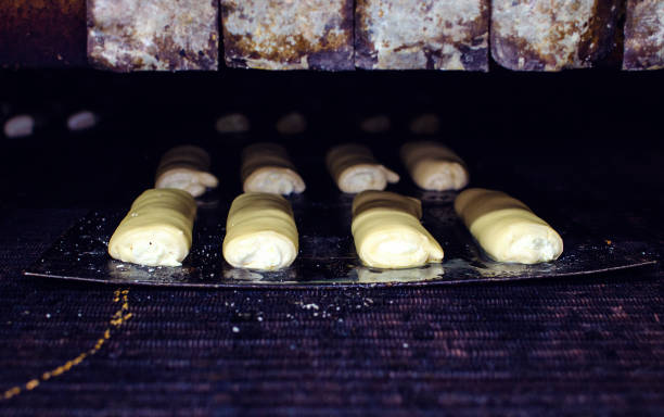 istock Sweet pastry going to a large oven 944722278