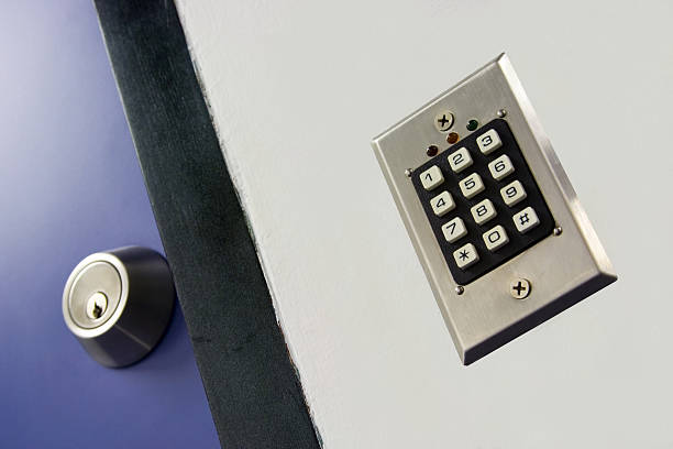 istock Security keypad on wall next to door with key lock 94472270