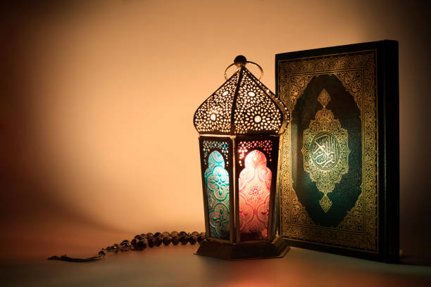 istock lantern and Muslims Holy book Quran 944724398