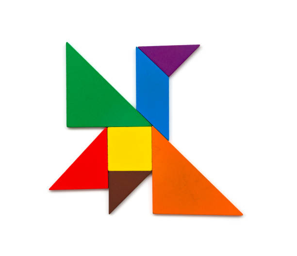 istock wooden tangram shaped like a flying bird on white 944726574