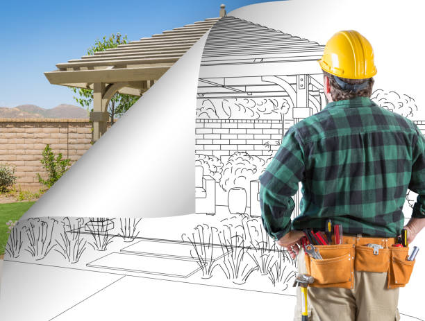 istock Contractor Facing Pergola Drawing with Page Flipping to Completed Photo Behind 944729440