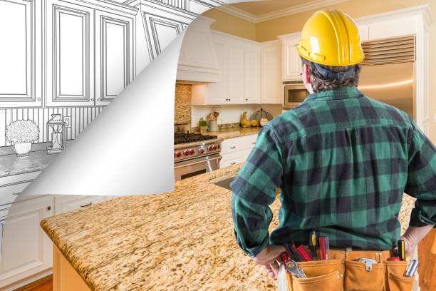 istock Contractor Facing Kitchen Photo with Page Corner Flipping to Drawing Behind 944729448