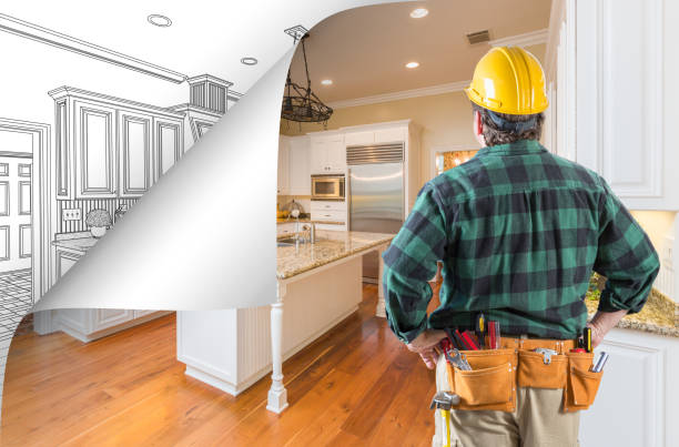 istock Contractor Facing Kitchen Photo with Page Corner Flipping to Drawing Behind 944729450