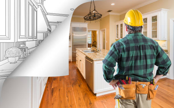 istock Contractor Facing Kitchen Photo with Page Corner Flipping to Drawing Behind 944729460