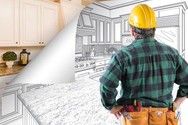 istock Contractor Facing Kitchen Drawing with Page Corner Flipping to Completed Photo Behind 944729508