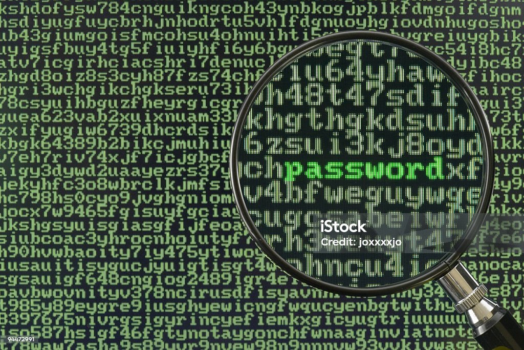 Magnifying glass focused on single word, Screen full of alphanumerics depicting encryption and the word password emphasized by a magnifying glass Accessibility Stock Photo