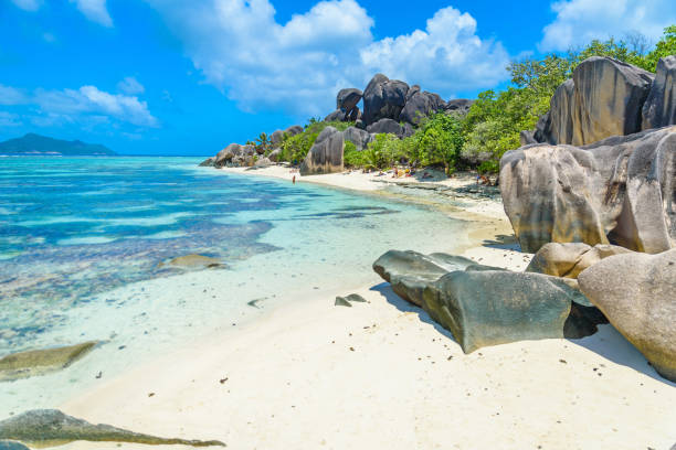 istock Source d'Argent Beach at island La Digue, Seychelles - Beautifully shaped granite boulders and rock formation - Paradise beach and tropical destination for vacation 944730340