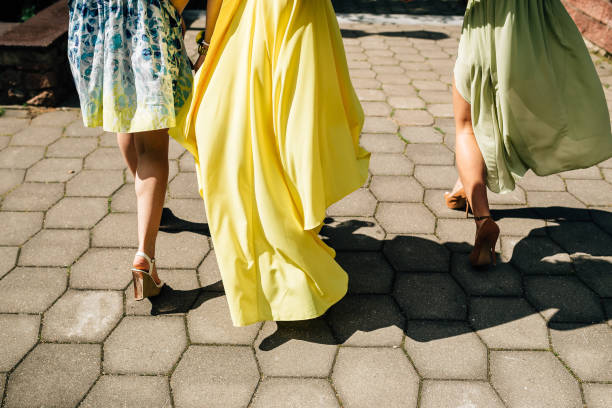 istock girls in colored dresses, summer 944730844