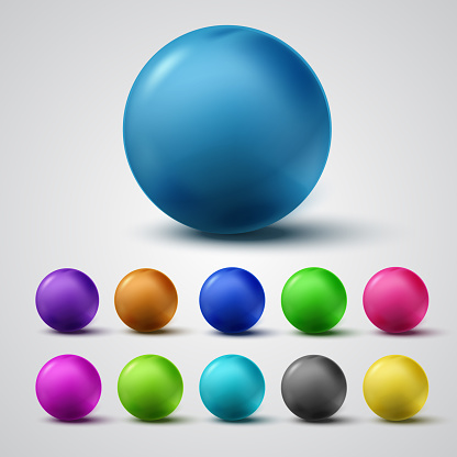 Set of colorful glossy spheres isolated on grey background. Vector balls.
