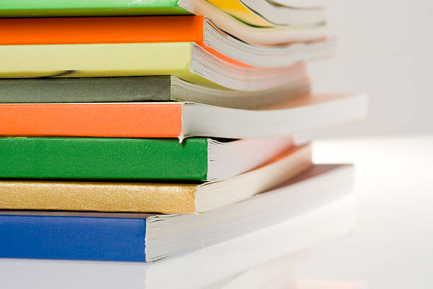 istock Stack of colorful softcover books 94473655