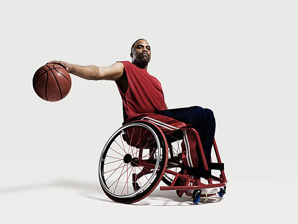 Wheelchair basketball player  athlete with disabilities photos stock pictures, royalty-free photos & images