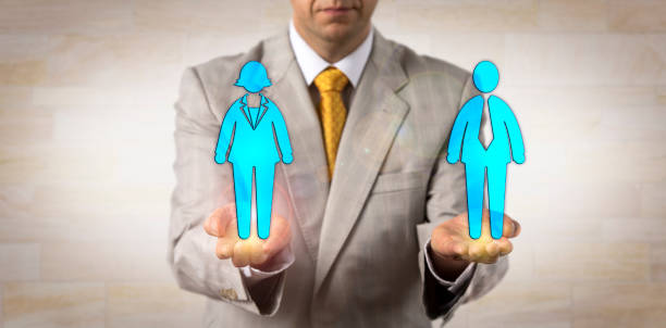 istock Recruiter Presenting Woman On A Par With Man 944747182
