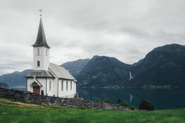 Typical christianity church with cemetery in Norway
