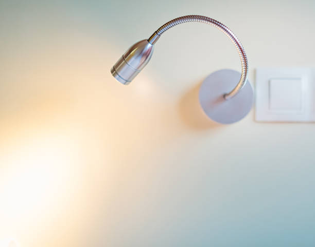 istock Modern steel metallic wall light under the bed 944771376