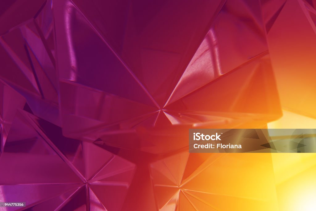 Hot gradient Crystal gradient from yellow to purple, studio shot. Diamond - Gemstone Stock Photo