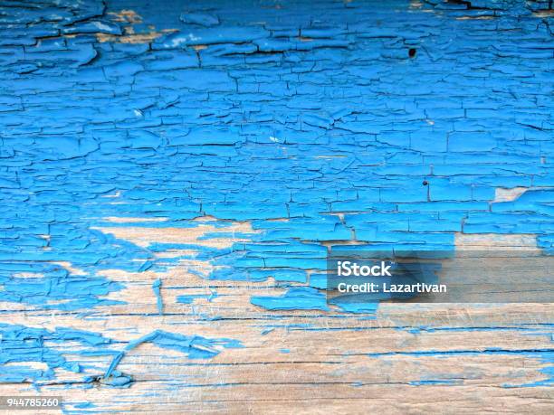 Wooden Texture With Cracked Blue Paint Old Pattern With Shabby Paint Cracked Blue Surface Abstract Background For The Designer Blank For The Designer Vintage Style Stock Photo - Download Image Now
