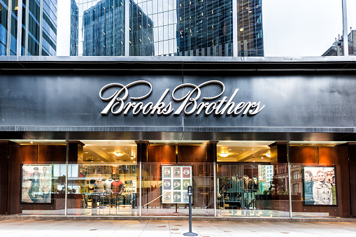 New York City, USA - October 30, 2017: Sign on the building of Brooks Brothers business clothing store in Manhattan NYC lower financial district downtown