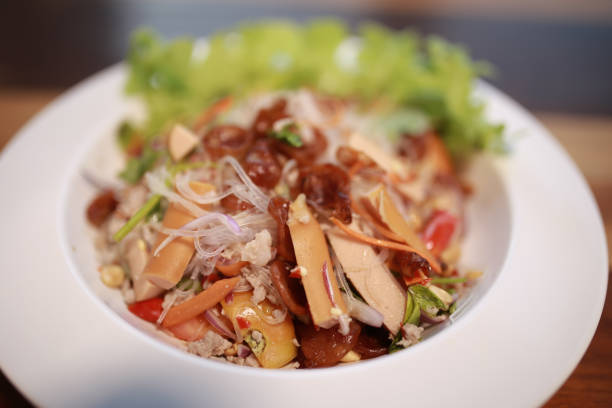 istock Yummy Vermicelli with Pork Ham  Mushroom and Shrimp 944789538