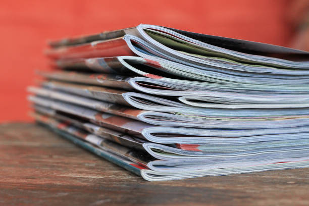 istock Magazines on the wooden table 944789892
