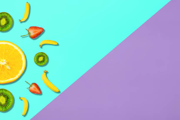 istock Digitally Generated Image Of Fruits On Colored Background 944800608