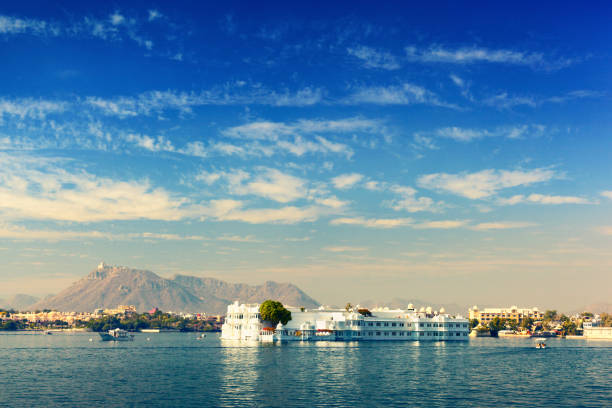 Lake Pichola in Udaipur Lake Palace (formerly known as Jag Niwas) on Lake Pichola. Udaipur, Rajasthan, India lake palace stock pictures, royalty-free photos & images