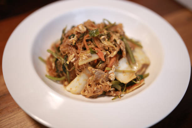 istock Yummy Vermicelli with Pork Ham  Mushroom and Shrimp 944805276