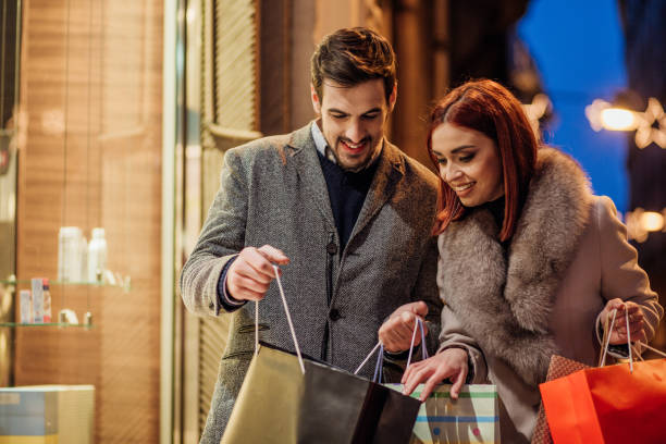 istock Couple looking in shopping bag 944818606