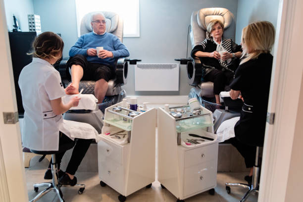 istock Senior couple having a pedicure in a beauty spa. 944819734