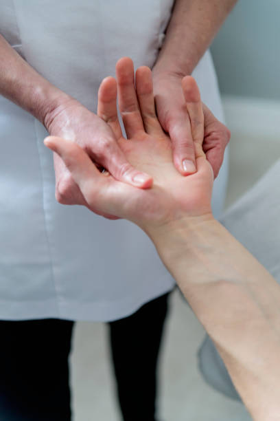 istock Hand and massage to young man in beauty spa. 944822918