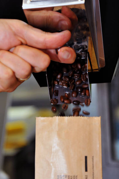istock operation of mixing roasted coffee 944829554