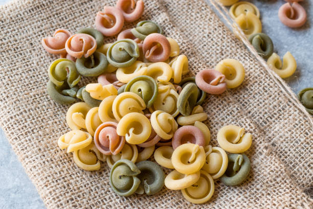 istock Ufo Shaped Colorful Junior Raw Pasta on Sack / Colored or Tri Color 944829600